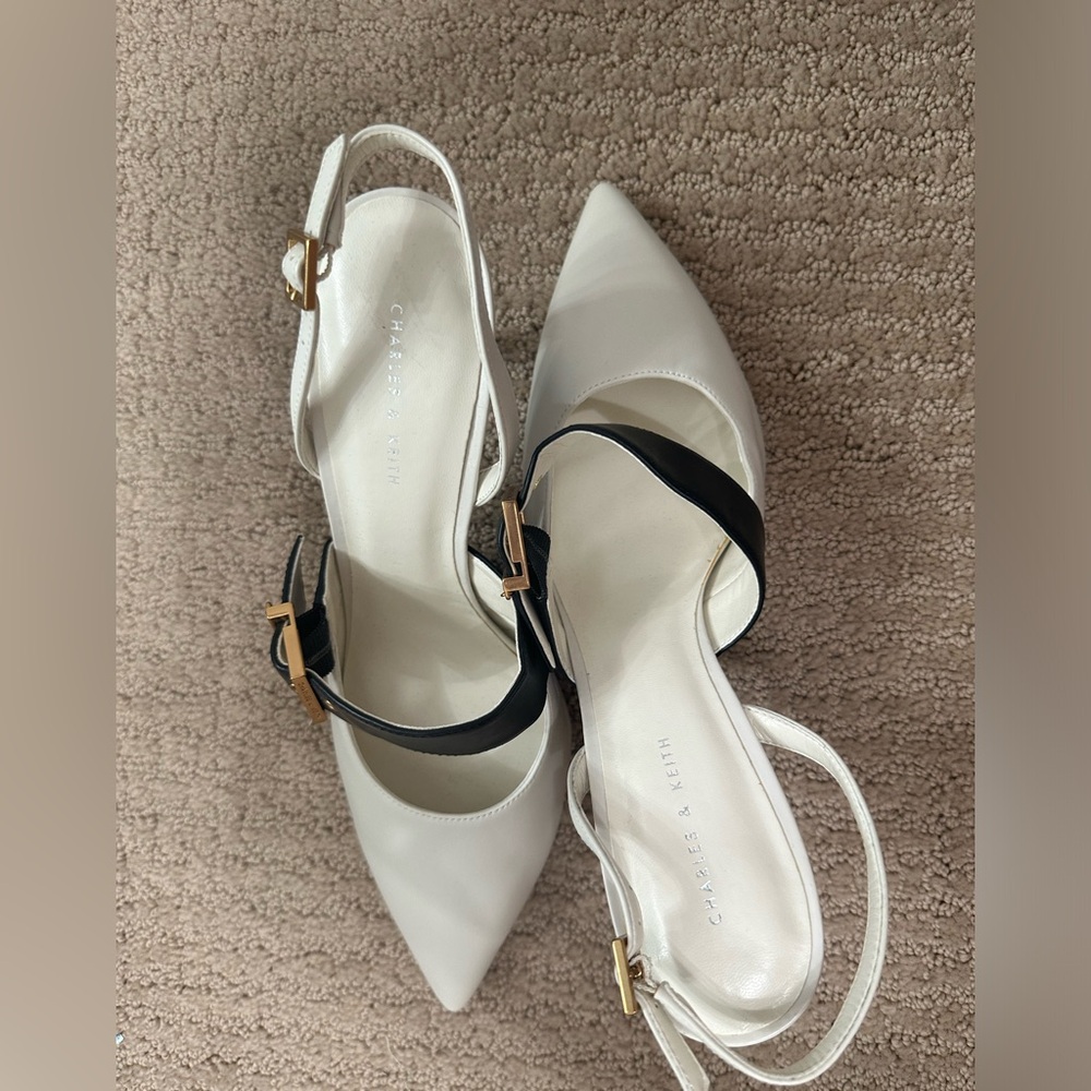 Charles & Keith white and black pumps